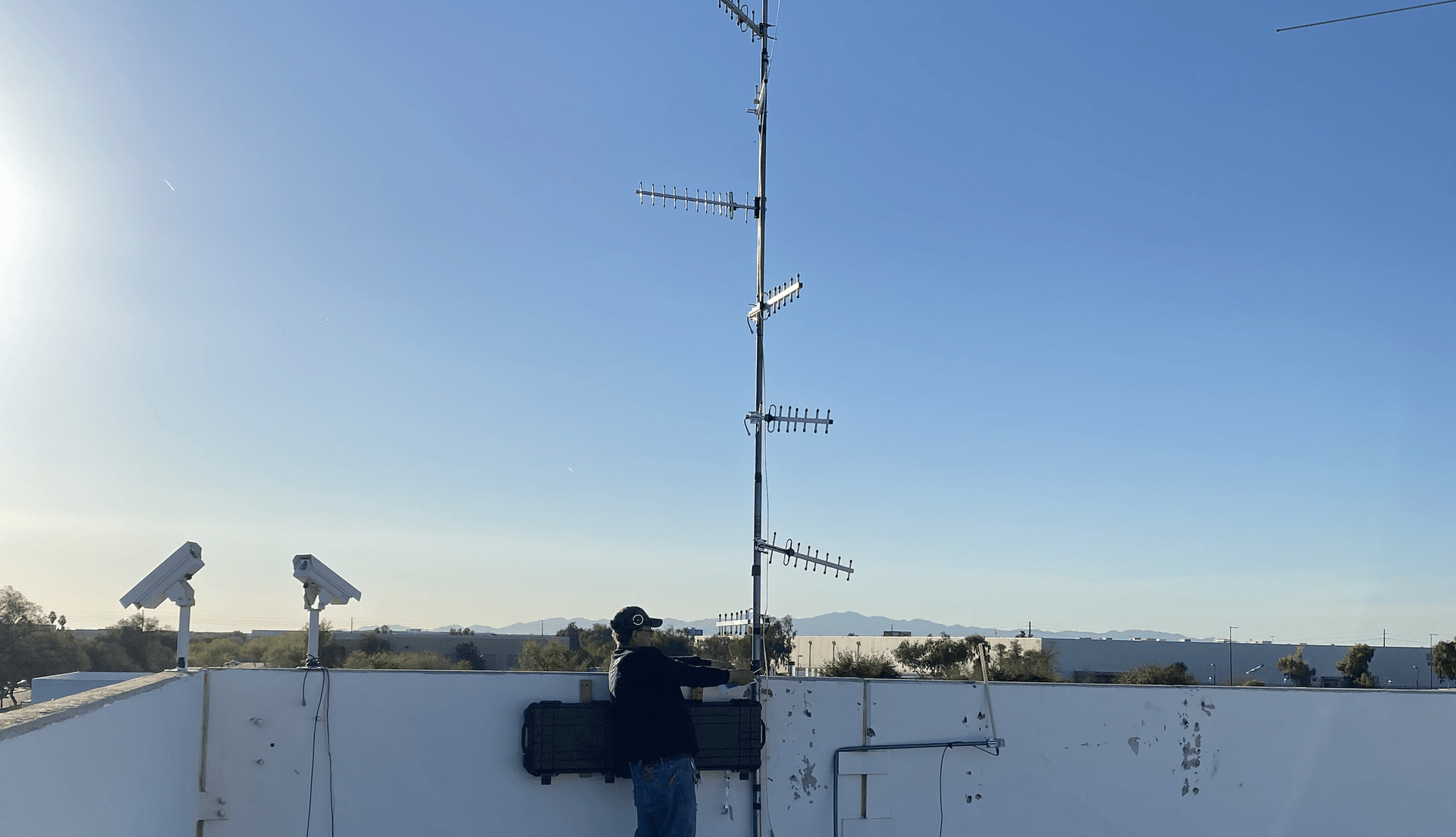 Installing Helium IoT antenna on rooftop for optimal coverage and mining rewards