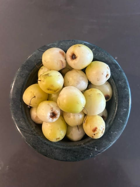 Bowl of pale homegrown fruit